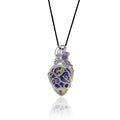 Drop-shaped original handcrafted stone pendant, hand painted with blues and accented with mauve; sterling silver scrollwork on the front, amethyst beads with silver and glass beads at the top, hung from a silk cord.