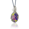 Sterling silver pendant necklace with a hand-painted floral and swirl design in purple, pink, yellow, and green, hung from a black silk cord.