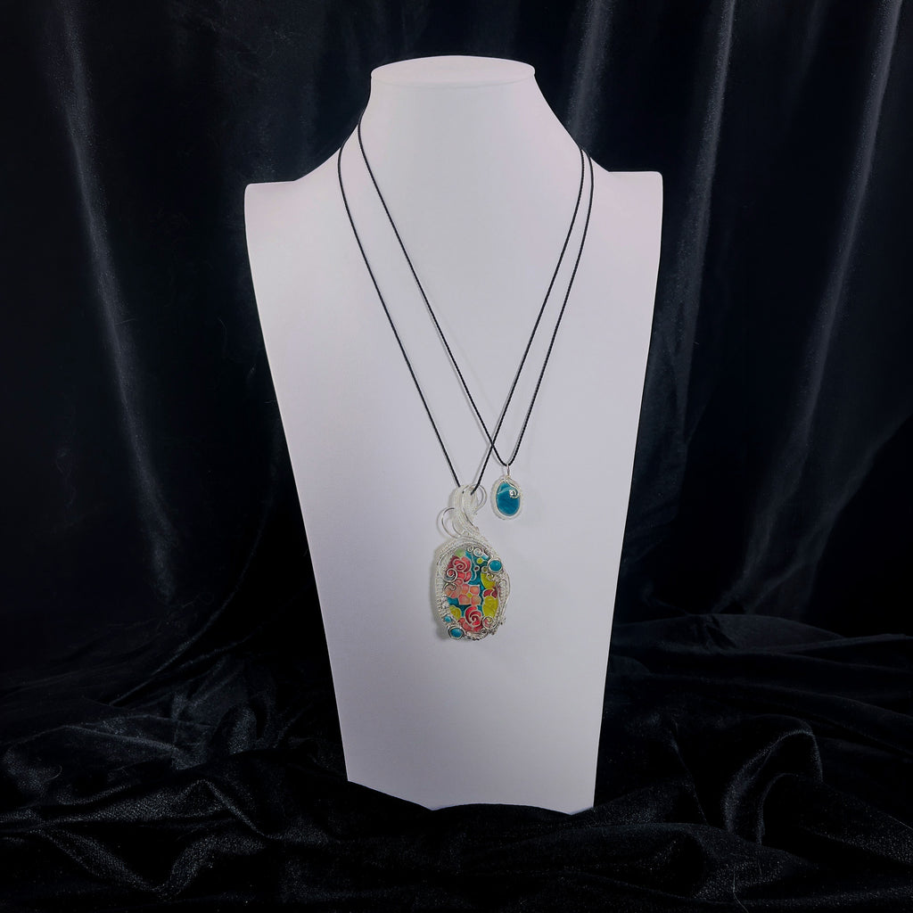 Triad Pendant Set displayed on a bust to show scale.