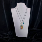 Triad Pendant Set displayed on a bust to show scale.